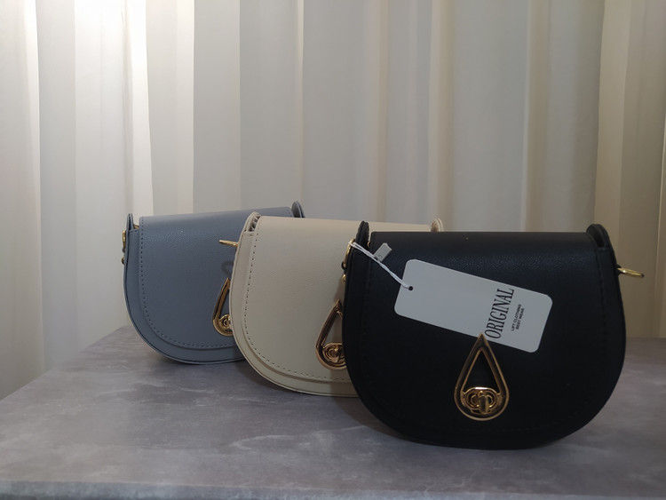 کیف پاسپورتی مدل اشکی زنانه